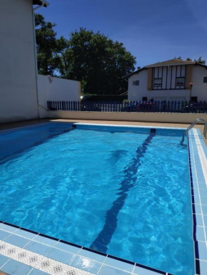 Coqueto apartamento con piscina comunitaria
